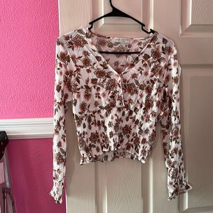 Super cute Medium Paper Crane top. Floral design. Long sleeved